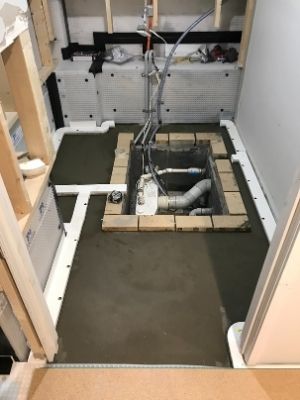 Forming and setting in of the in floor sump system